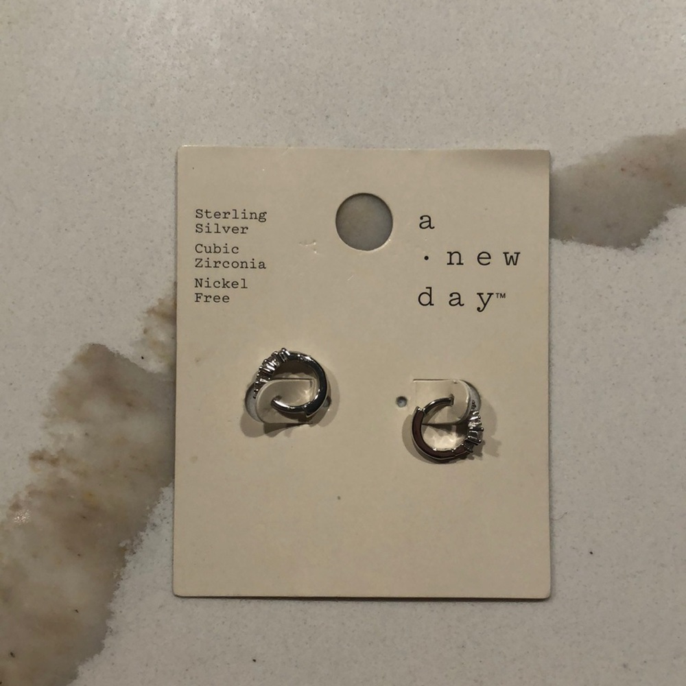 Sterling silver earrings. Never worn.